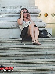 Upskirts on stairs. Sexy cutie voyeured sitting