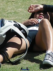 Sexy upskirt. Young prettie voyeured in a park.