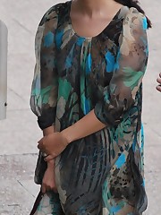 Wind upskirt - Wind lifts her dress's skirt up