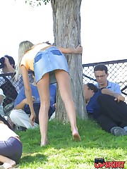 Accidental upskirt. Hot blonde in denim mini upskirt photo