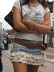 Tight butt up her pleated skirt. Spy upskirt up skirt pic