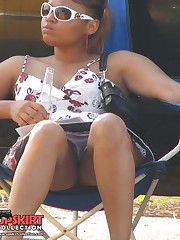 This chocolate babe is very hot. Up the skirt upskirt shot