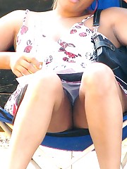This chocolate babe is very hot. Up the skirt upskirt no panties