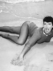 Kinky nude Betty Page upskirt pussy