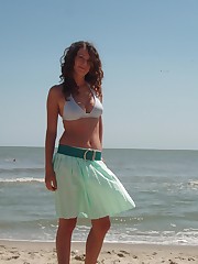 A hot babe posing at the Nugal up skirt pic