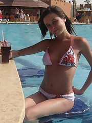 A girl removing her micro bikini at the Peka Peka upskirt pantyhose