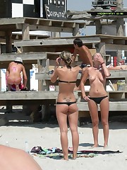 A busty bikini girl undressing on the Coralita up skirt pic