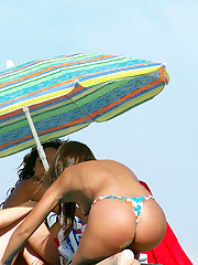 A babe on open swim suit at the Paradise upskirt photo