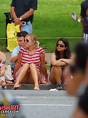 Upskirting. two ckicks in striped dresses up skirt pic