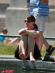 Cute babe in mini peeked. Real street upskirt upskirt photo