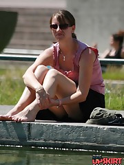 Cute babe in mini peeked. Real street upskirt celebrity upskirt