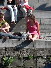 Busty chick voyeured in public. Up skirt sitting upskirt picture