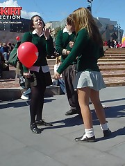Schoolgirl upskirt - legal teen in green skirt spyed upskirt photo