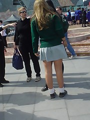 Schoolgirl upskirt - legal teen in green skirt spyed upskirt shot