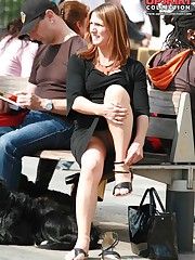 Redhead milf on a bench. Candid sitting upskirt up skirt pic