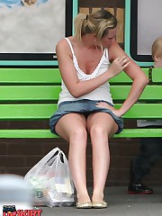 Upskirt sitting - blonde in mini at the bus stop up skirt pic