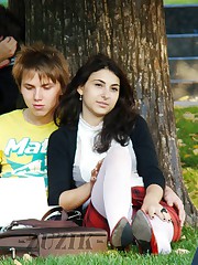 Hot brunette shows stockings up skirt up skirt pic