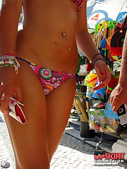 Bikini babe providing with beach fun upskirt pic