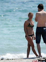 Babe playing with her hot bikini ass up skirt pic