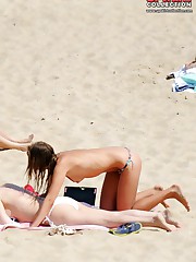 Bikini girls behave kinkily in public upskirt picture