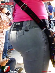 Babes in jeans get spied from behind upskirt picture