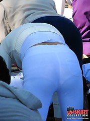 Nude titted doll in blue tight jeans upskirt photo