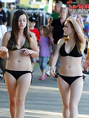 Slutty chicks wearing tiny swimsuits candid upskirt