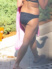 Latin girl with big tits in bikini upskirt pic