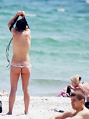 Girls on the beach wear nice bikinis upskirt no panties