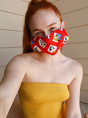 Contestant 18 is from Texas. She is obviously a natural redhead or has me fooled completely. She admits to having her photographer friend help her with the camera, but I assured her that it was well within the rules. Is it weird that masks are starting to look sexy to me now? upskirt shot