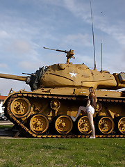 I drove up the coast to meet Lauralynn Parrish. She is 19 and full of eager to shoot for Zishy. Being that she dates a military man, I thought this old tank we found would make a good background. Lauralynn then showed me her favorite local cafe where they make a mean Nutella and banana milkshake topped with heavenly whipped cream. Captain  Tennille's Love will keep us together is the song in the bonus video. upskirt pic
