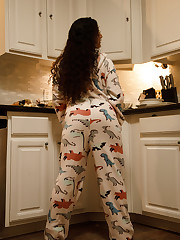 Lana Lovelace greeted me at her door in her full-bodied, dinosaur pajamas. She asked me what she should put on for the shoot. Like Cobain said, Come as you are. Lana is a strange mix of deviancy, anxiety, and curiosity. She says that half her fans love her bush and the other half hate it. Well, even Jesus couldn't get everyone to like him. Hope your holidays are as stress-free as possible. upskirt photo