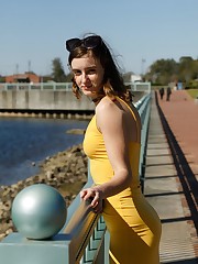 One of our favorite exclusive muses is back. This time Meadow Brink battles the midday elements in Pensacola Bay. The sun and wind fought valiantly, but were no match for Meadow and her yellow dress sans undergarments. Knowing this unique woman for several years now, I can attest to Meadow's fluctuating moods. But when her energy is on, it in ON! As always, I consider it a great privilege to be able to document her for you. I will be adding a new xtra of MB tomorrow. Be ready. upskirt picture