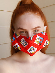 Contestant 18 is from Texas. She is obviously a natural redhead or has me fooled completely. She admits to having her photographer friend help her with the camera, but I assured her that it was well within the rules. Is it weird that masks are starting to look sexy to me now?